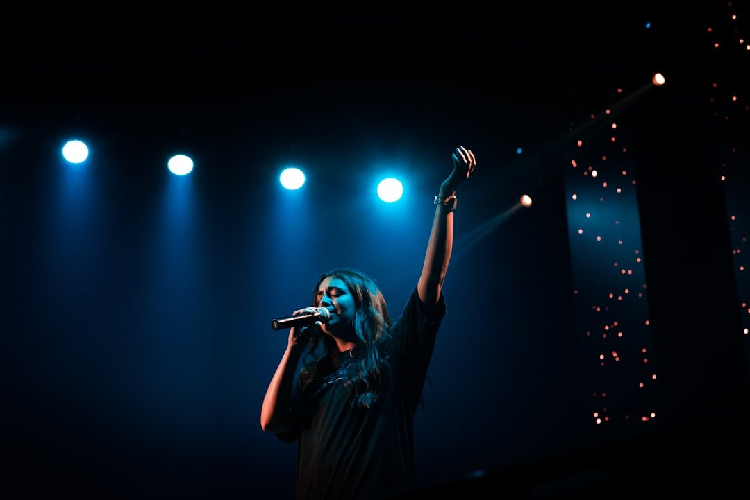 singer performing on stage